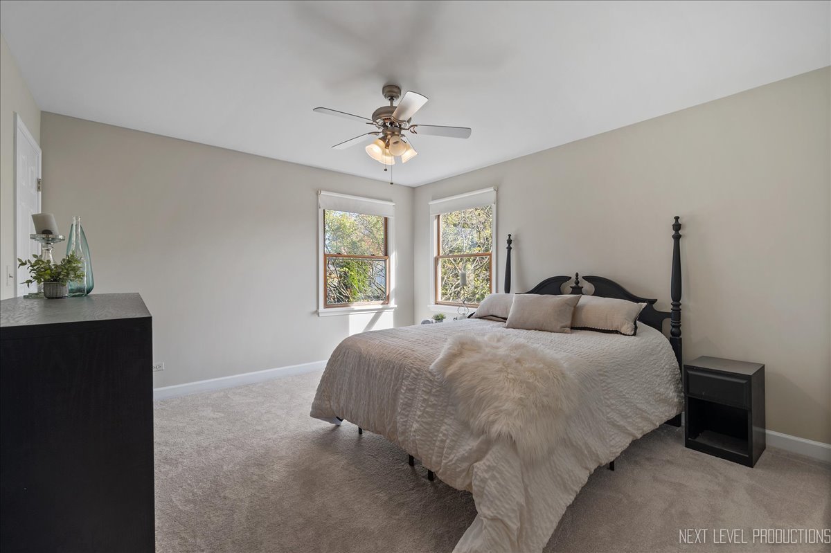 473 Bond Drive Batavia, IL 60510 - Photo 26 of 39 a bedroom with a bed and window