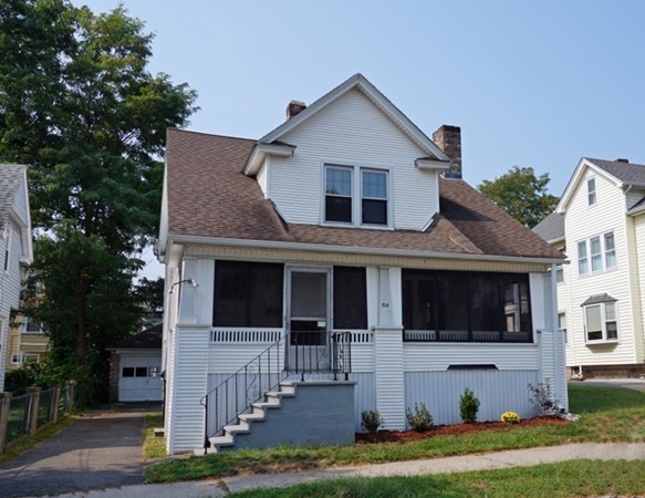 58 Shawmut Street Springfield, MA 01108 - Photo 1 of 26 a front view of a house with a yard