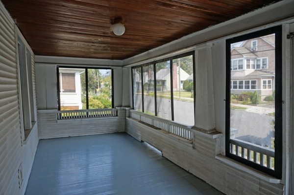 58 Shawmut Street Springfield, MA 01108 - Photo 17 of 26 a view of an empty room with a window