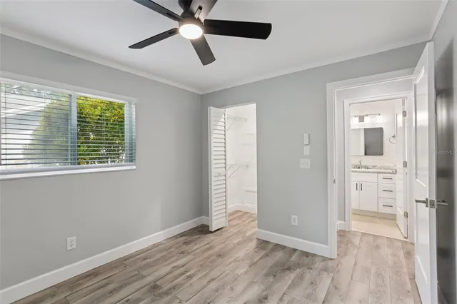 a view of house with backyard space and garden