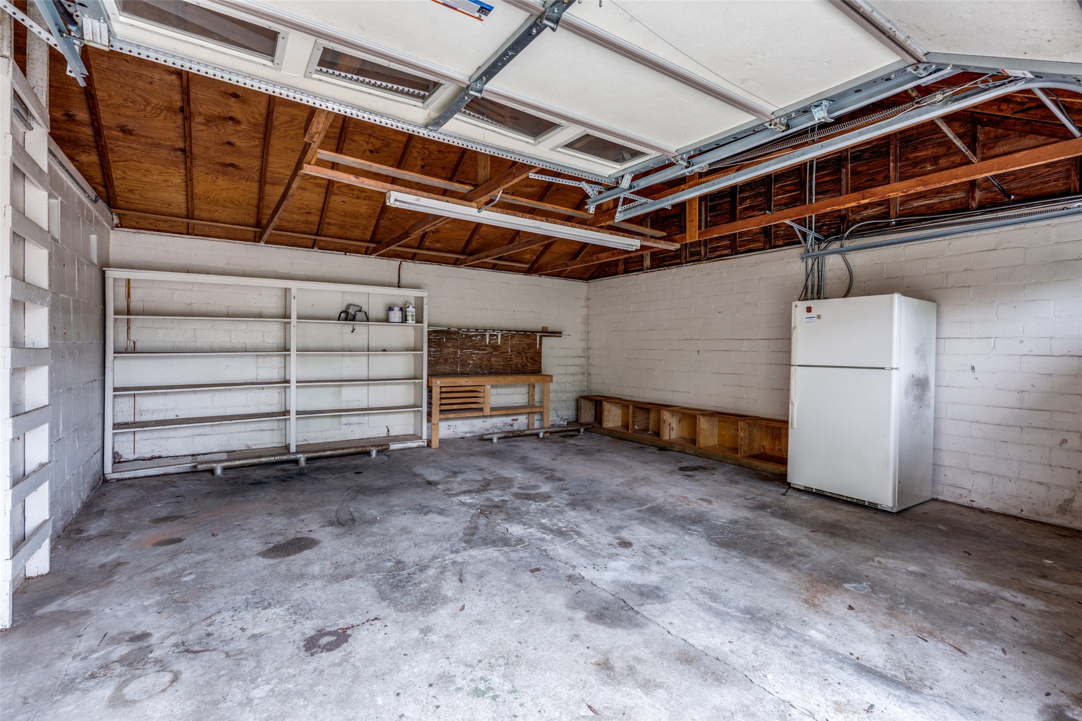 520 South Pecan Avenue Luling, TX 78648 - Photo 18 of 23 Spacious two car garage with original hitch from the old days for hitching your carriage horses up. Rumor has it this was an old dentist office.