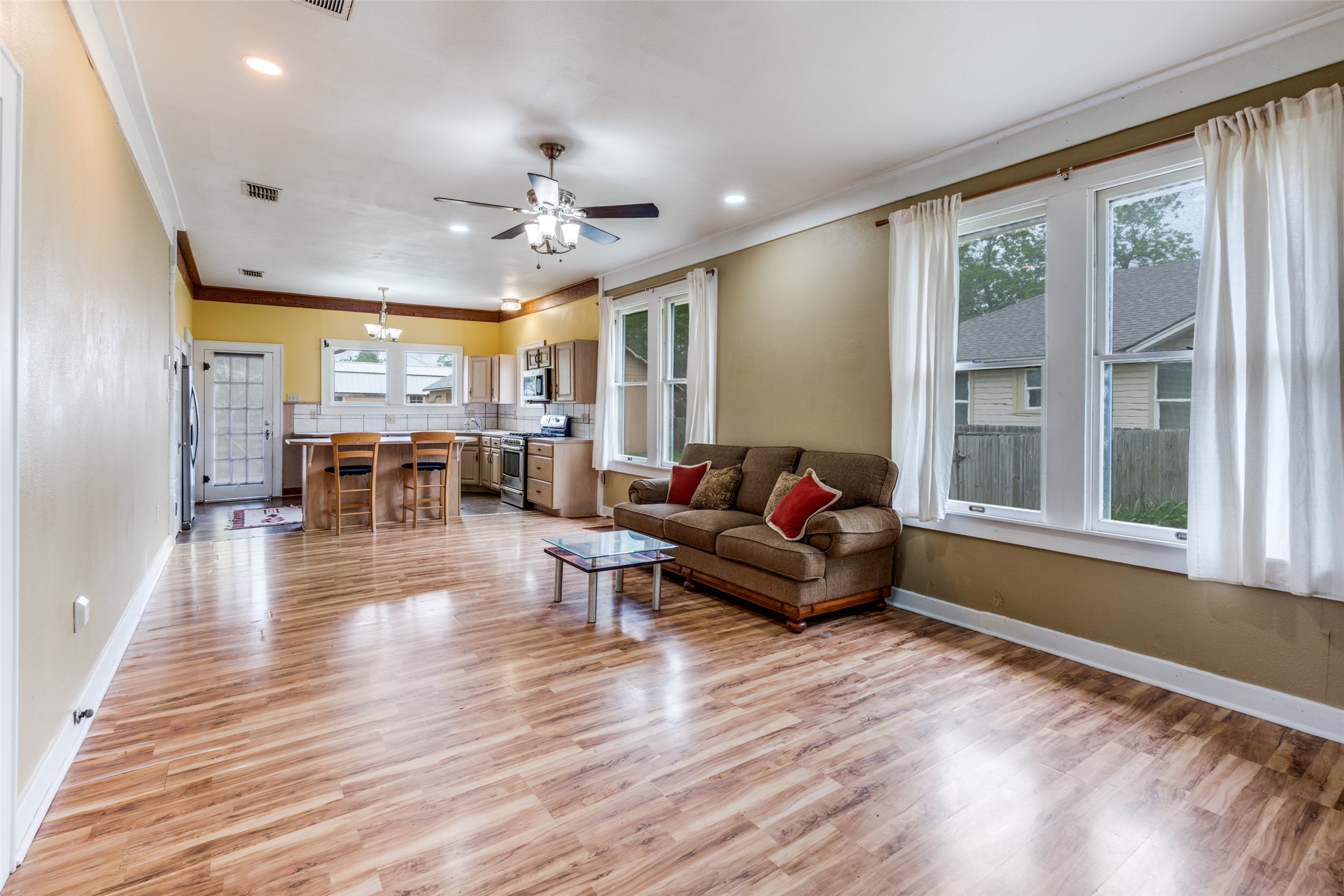 520 South Pecan Avenue Luling, TX 78648 - Photo 6 of 23 Open living to kitchen, this is waiting for someone to make it their own!