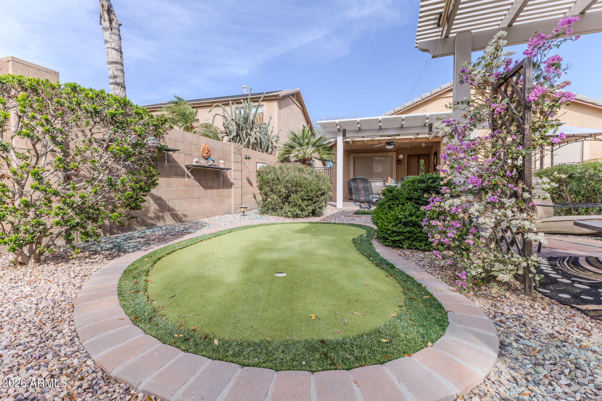 1073 East Taylor Trail San Tan Valley, AZ 85143 - Photo 30 of 30 a view of a swimming pool with a patio