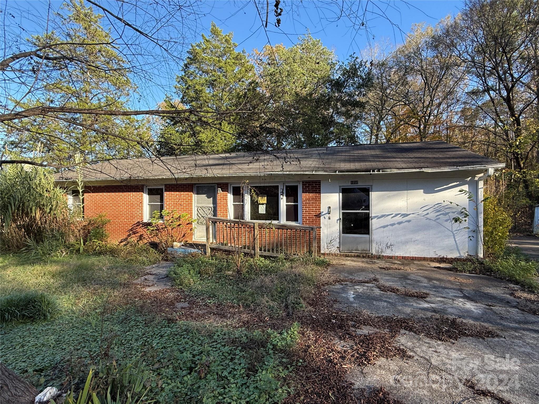 1050 South Lake Drive Lancaster, SC 29720 - Photo 1 of 15 a view of house with backyard