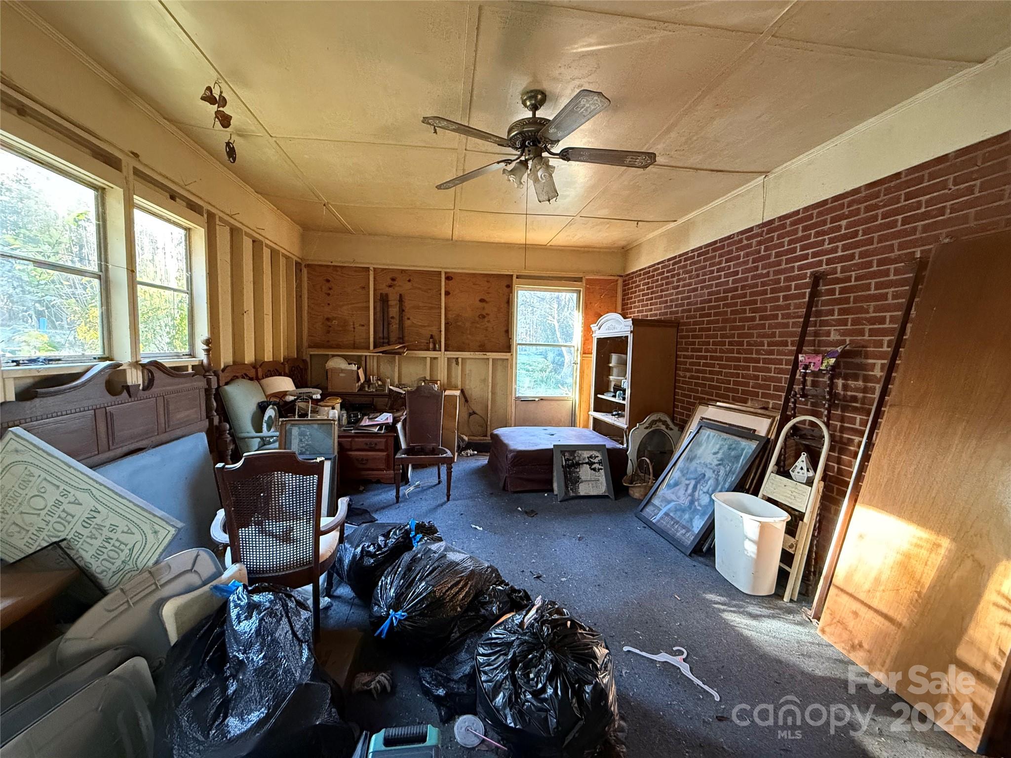 1050 South Lake Drive Lancaster, SC 29720 - Photo 13 of 15 a living room with furniture and a large window
