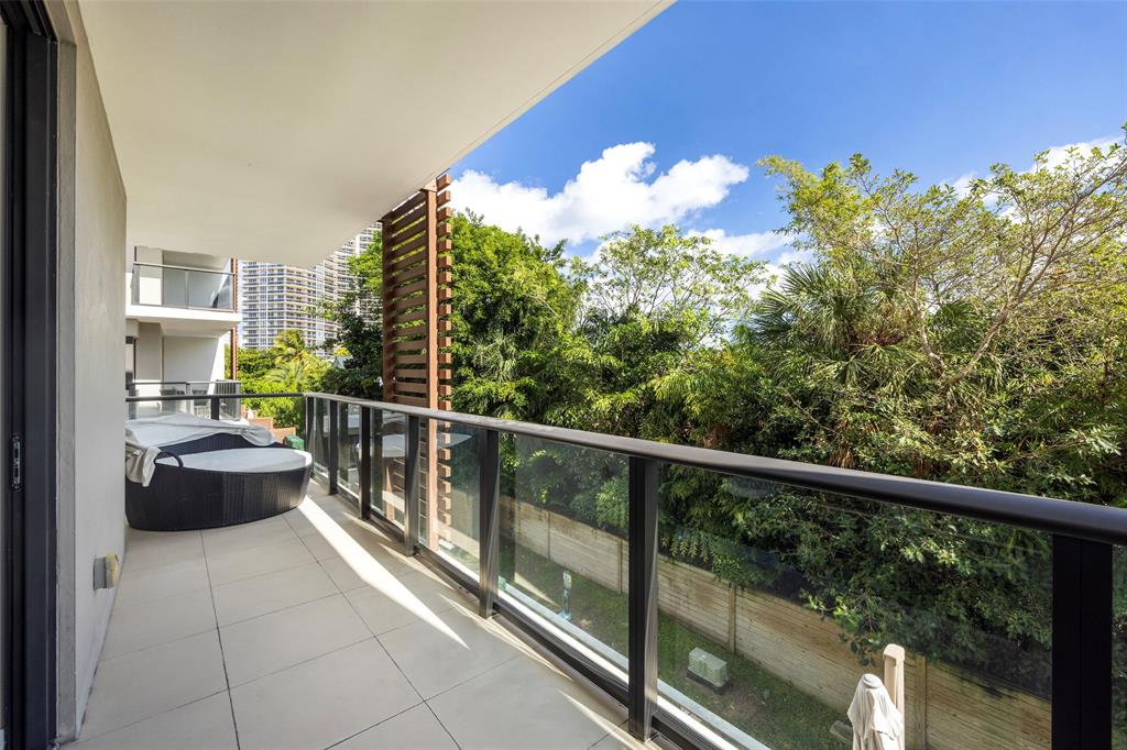 3030 North Ocean Boulevard, Unit S106 Fort Lauderdale, FL 33308 - Photo 30 of 40 a view of a balcony with chair