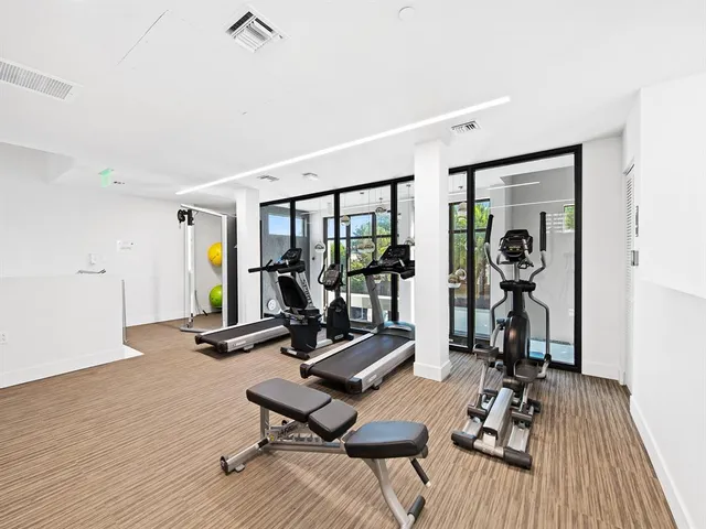 a view of a room with gym equipment