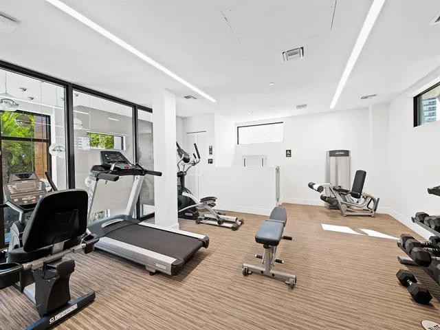a view of a room with gym equipment