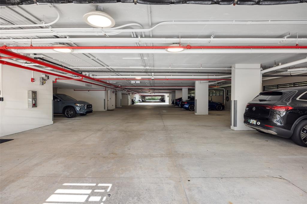 3030 North Ocean Boulevard, Unit S106 Fort Lauderdale, FL 33308 - Photo 39 of 40 a car parked in garage