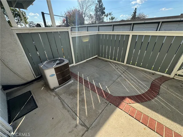 a view of a balcony with furniture