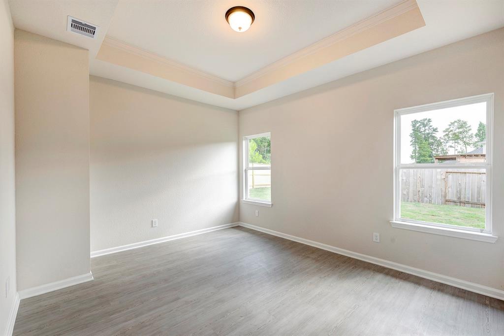 402 Heritage Grv Road Blue Ridge, TX 75424 - Photo 8 of 18 The Davenport II Primary Bedroom with Tray Ceiling