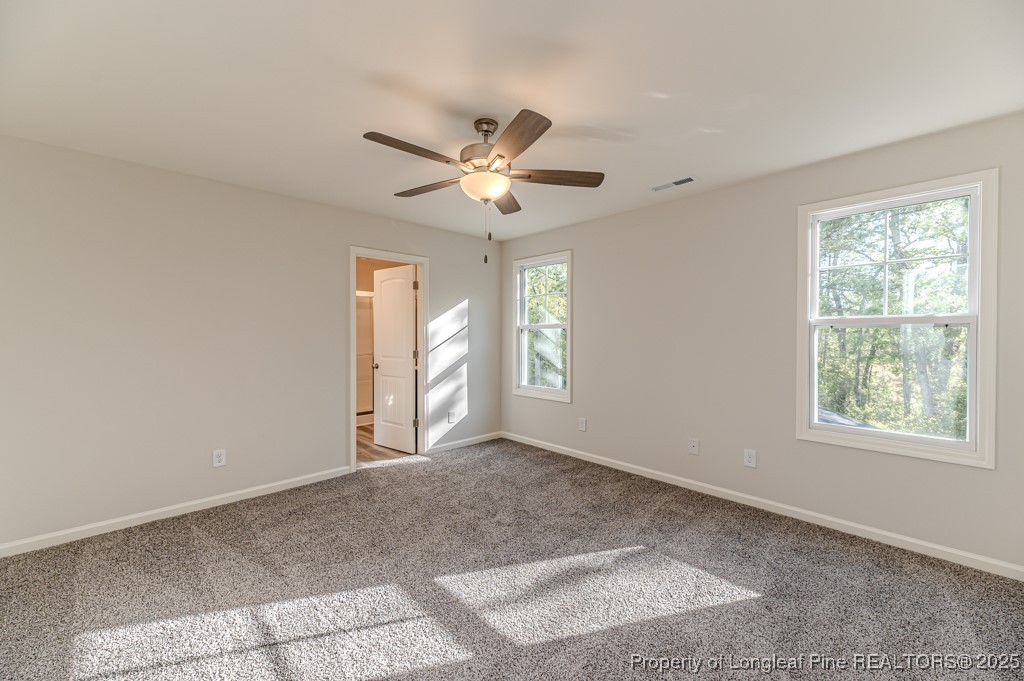 87 Onslow Court Spring Lake, NC 28390 - Photo 16 of 32 a view of an empty room with a window