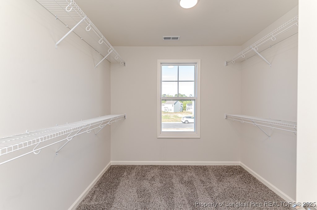 87 Onslow Court Spring Lake, NC 28390 - Photo 20 of 32 an empty room with windows