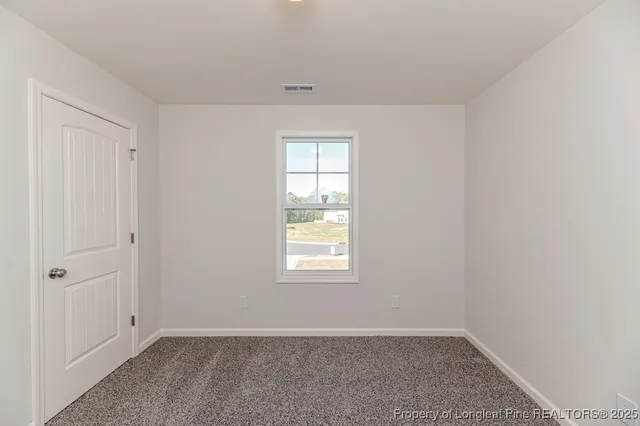 an empty room with window