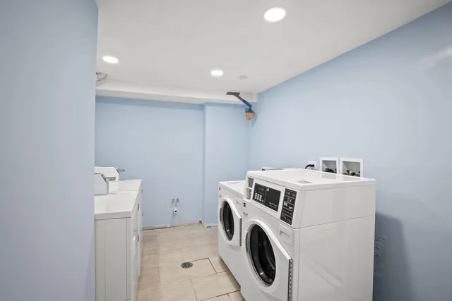 a utility room with dryer and washer