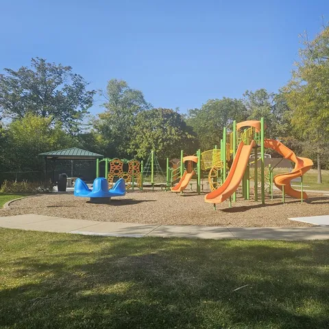 a view of a house with a park