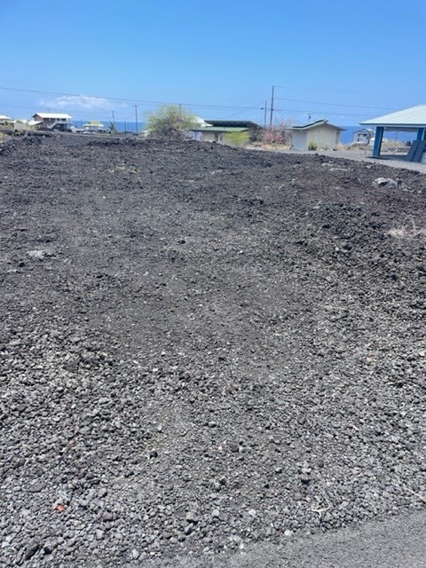 30 Ehiku Avenue Captain Cook, HI 96704 - Photo 6 of 7 a view of a dry yard with trees