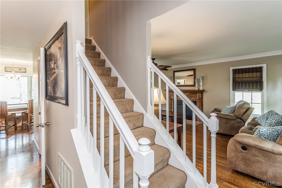 4824 Cedar Cliff Road Chester, VA 23831 - Photo 18 of 50 a view of an entryway with wooden floor and stairs