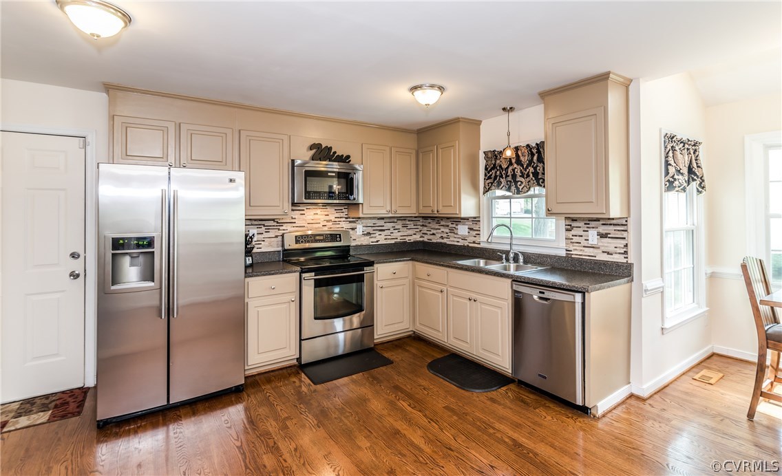 4824 Cedar Cliff Road Chester, VA 23831 - Photo 27 of 50 a kitchen with stainless steel appliances a refrigerator sink and microwave