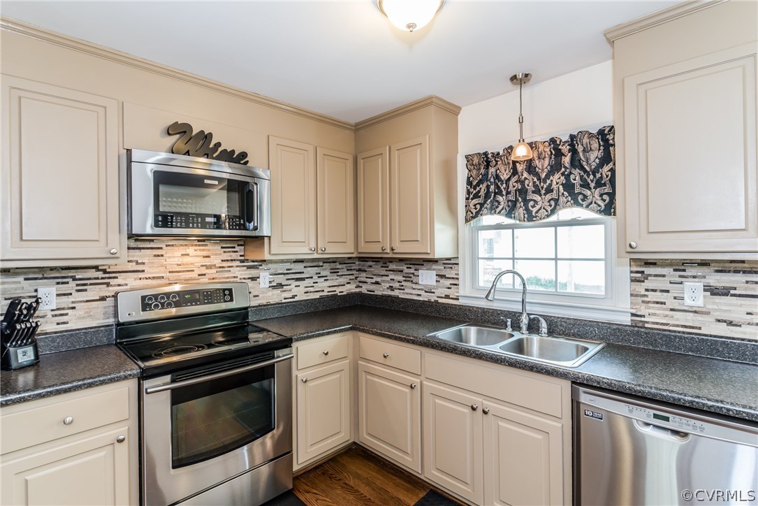 4824 Cedar Cliff Road Chester, VA 23831 - Photo 29 of 50 a kitchen with appliances cabinets and a sink