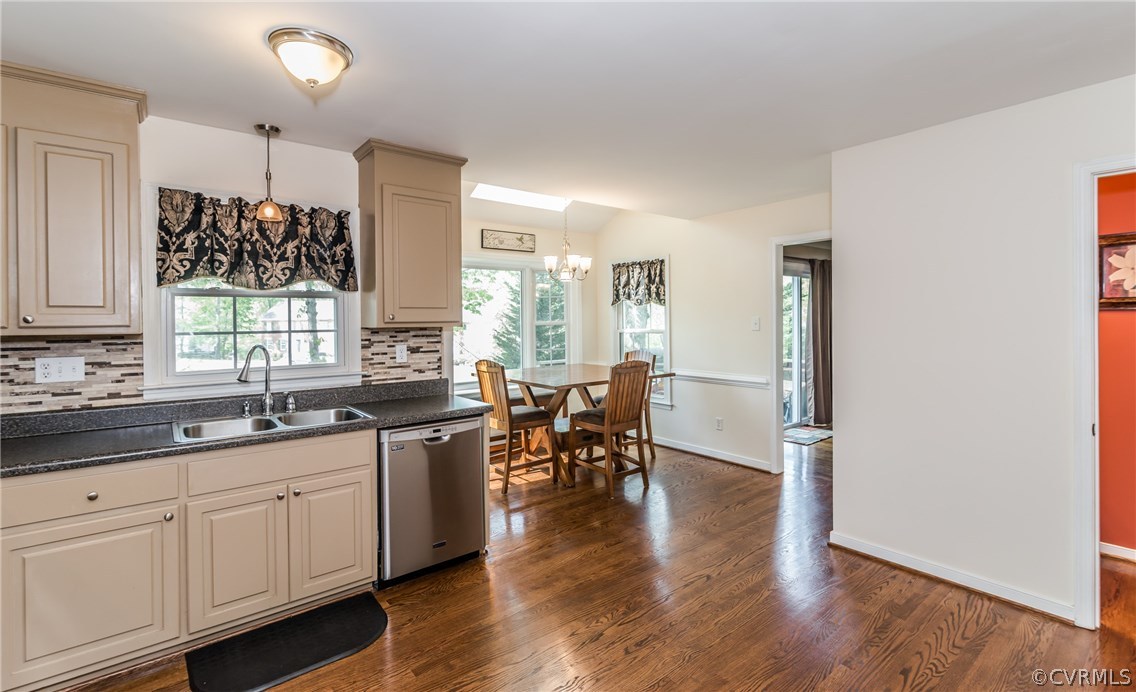 4824 Cedar Cliff Road Chester, VA 23831 - Photo 31 of 50 a kitchen with wooden floors and white cabinets