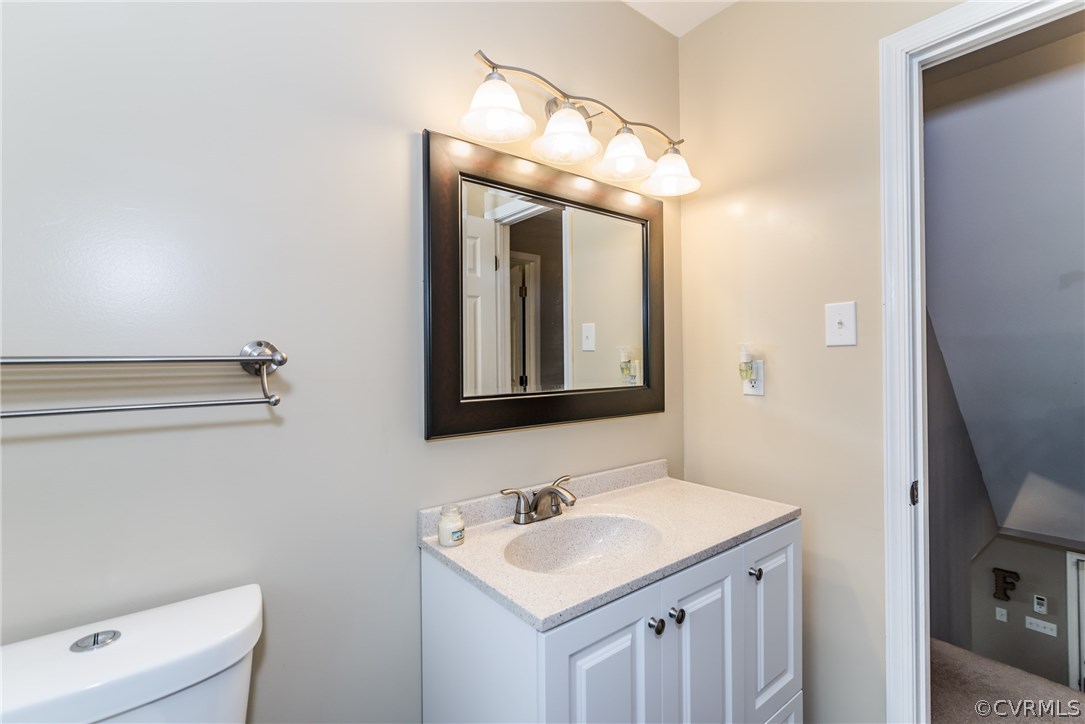 4824 Cedar Cliff Road Chester, VA 23831 - Photo 33 of 50 a bathroom with a sink and a mirror