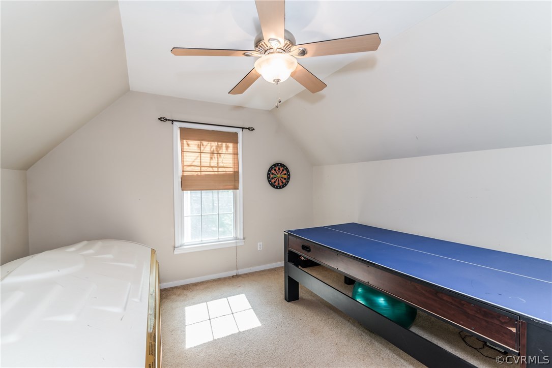 4824 Cedar Cliff Road Chester, VA 23831 - Photo 43 of 50 a room with window and chandelier fan