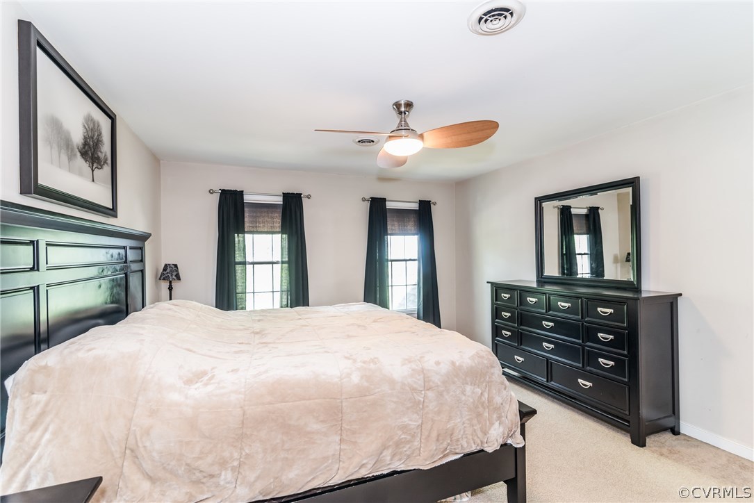 4824 Cedar Cliff Road Chester, VA 23831 - Photo 46 of 50 a bedroom with a bed and a dresser