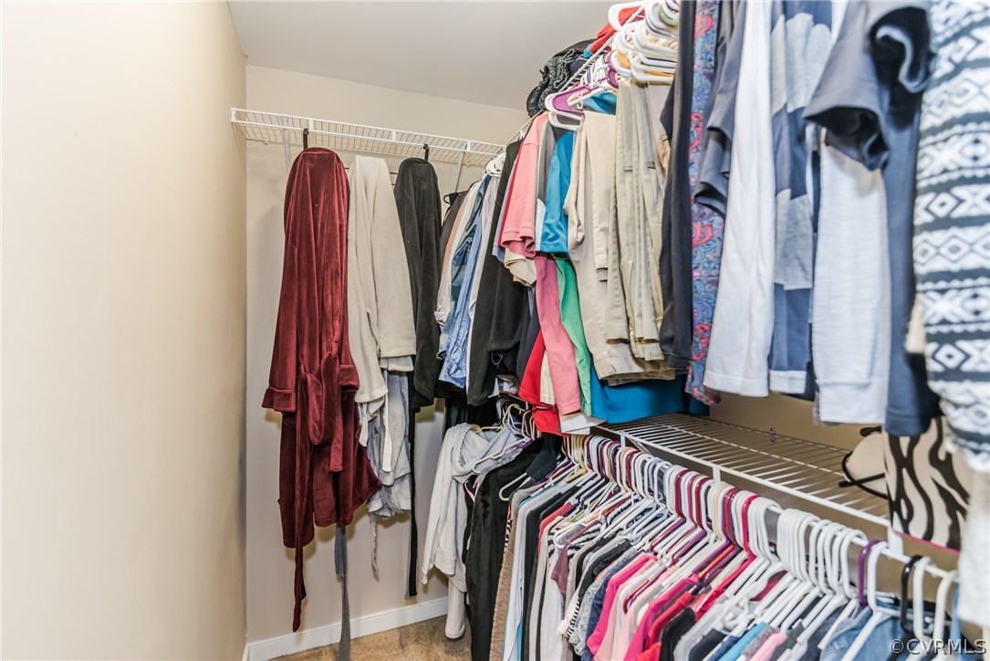 4824 Cedar Cliff Road Chester, VA 23831 - Photo 47 of 50 a view of walk in closet with clothes