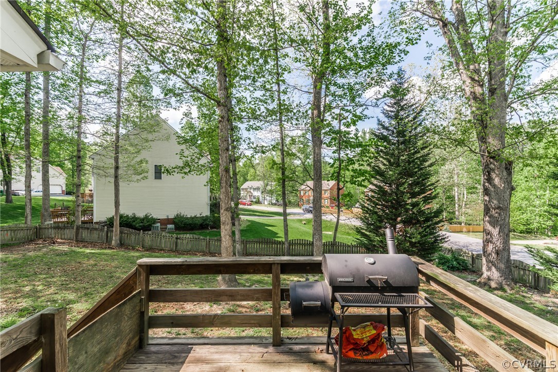 4824 Cedar Cliff Road Chester, VA 23831 - Photo 7 of 50 a view of a bench in a backyard