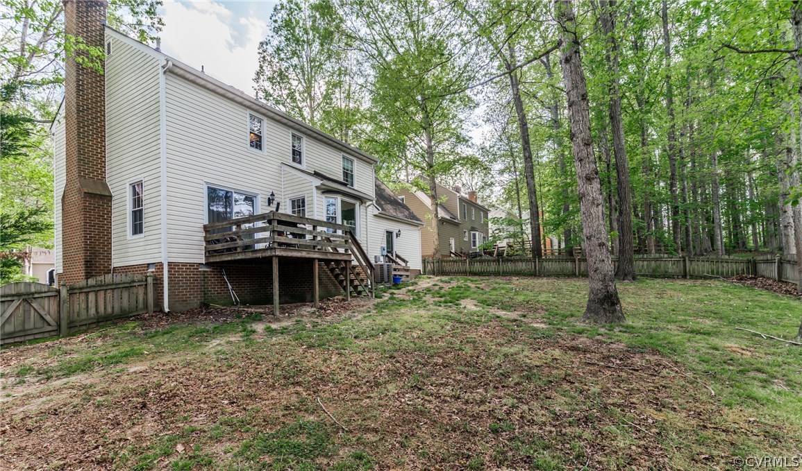 4824 Cedar Cliff Road Chester, VA 23831 - Photo 9 of 50 a backyard of a house with lots of green space