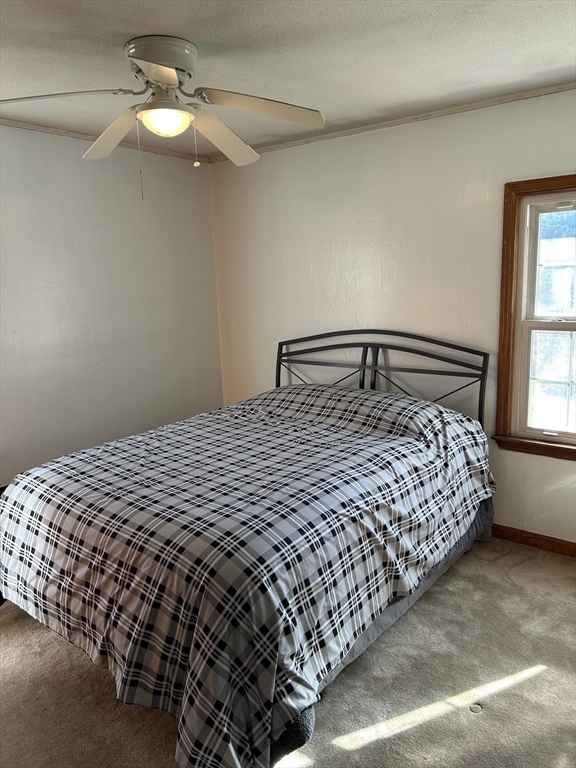 118 Spring Hill Road Ashby, MA 01431 - Photo 13 of 37 a bedroom with a bed and window