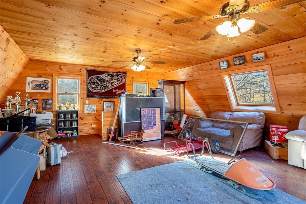 118 Spring Hill Road Ashby, MA 01431 - Photo 18 of 37 a view of a room with gym equipment