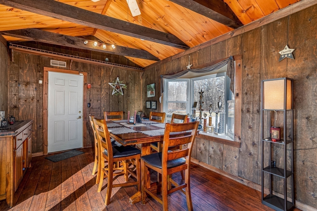 118 Spring Hill Road Ashby, MA 01431 - Photo 4 of 37 a view of a dining room with furniture and wooden floor