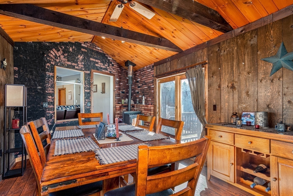 118 Spring Hill Road Ashby, MA 01431 - Photo 5 of 37 a view of an outdoor sitting area with furniture and barbeque grill