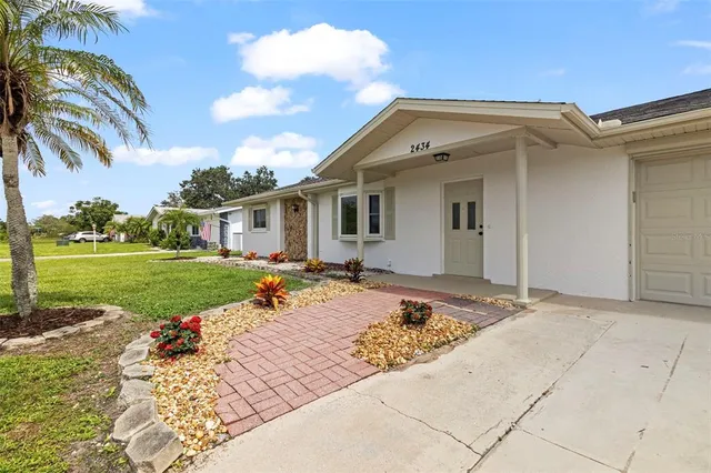 a view of a house with entertaining space