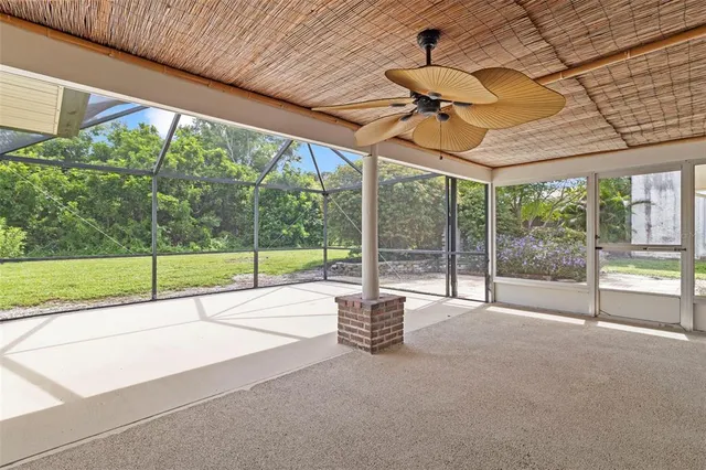 a view of an empty room with a fireplace