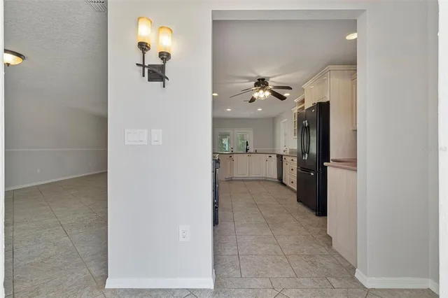 a view of a bathroom from the hallway