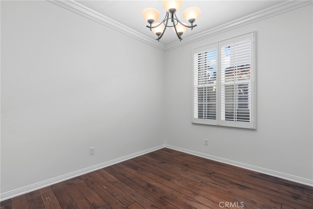 55 Bower Tree Irvine, CA 92603 - Photo 11 of 32 a view of a room with wooden floor and windows