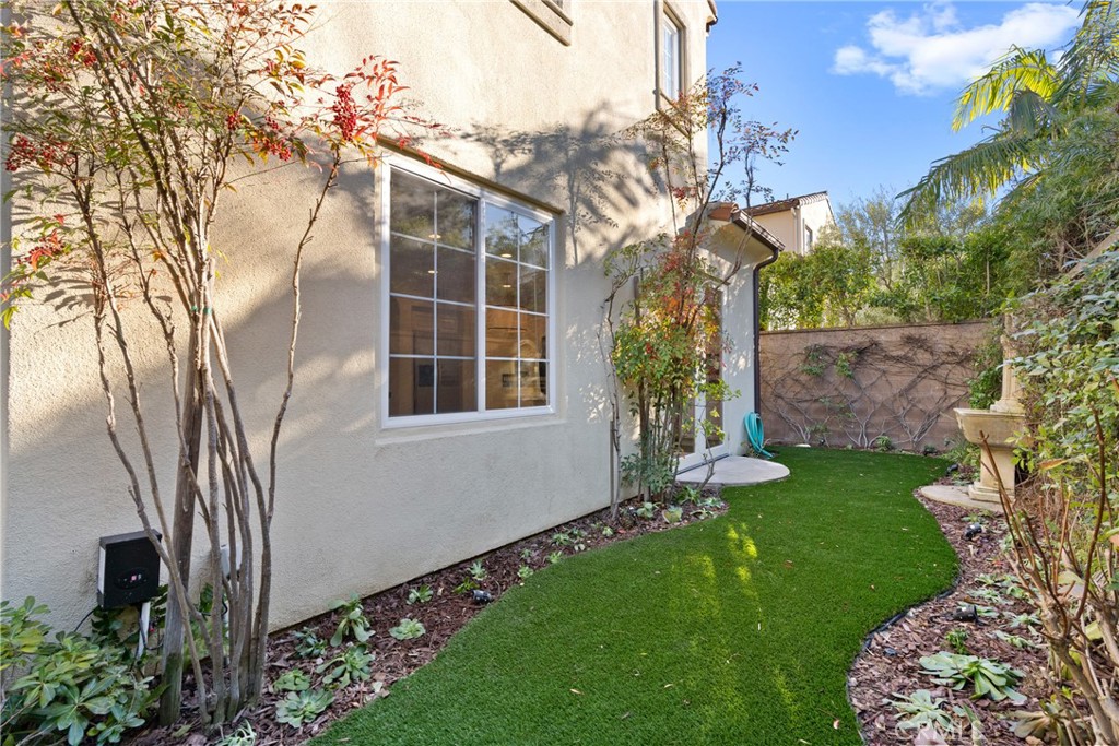55 Bower Tree Irvine, CA 92603 - Photo 26 of 32 a view of a house with a yard