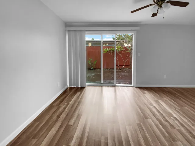 a bathroom with a sink and mirror with toilet