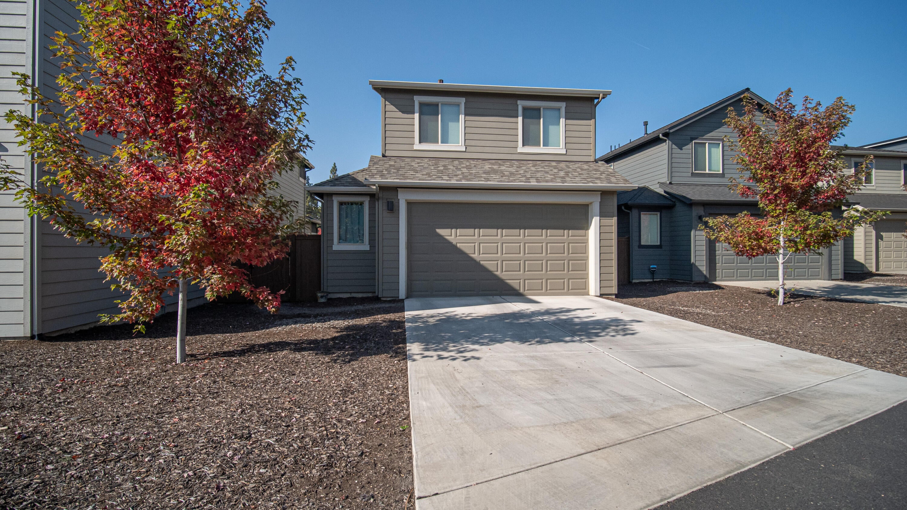 20896 Sotra Loop Bend, OR 97702 - Photo 14 of 21 Alley load double car garage with shop area as well.