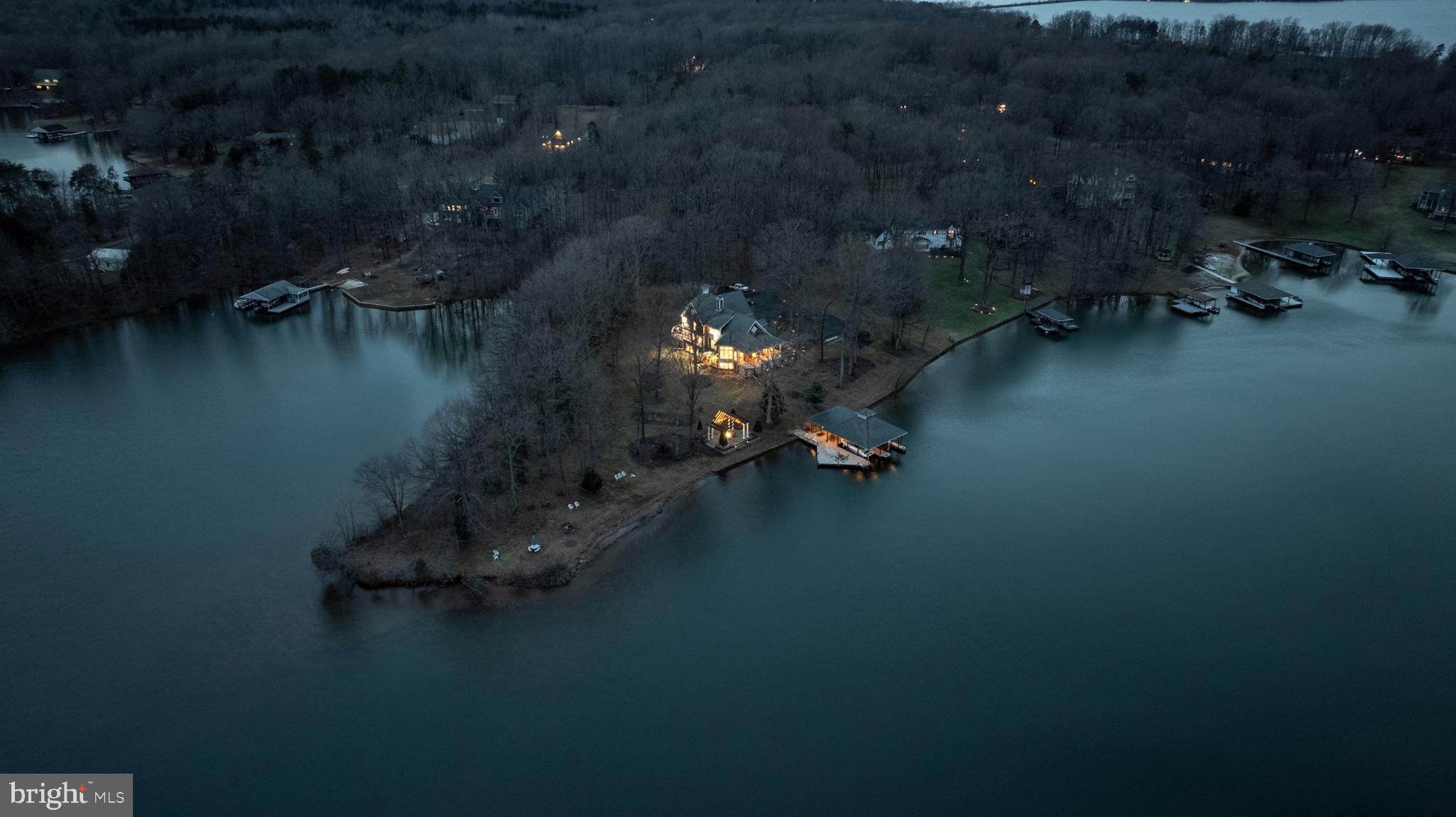 175 Covenant Way Bumpass, VA 23024 - Photo 87 of 91 Serene lakeside retreat at dusk.