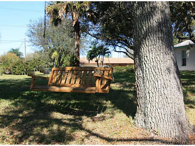 460 Southwest Harbor Street Stuart, FL 34997 - Photo 16 of 17 Yard/Garden. Wonderful Old Oak Trees