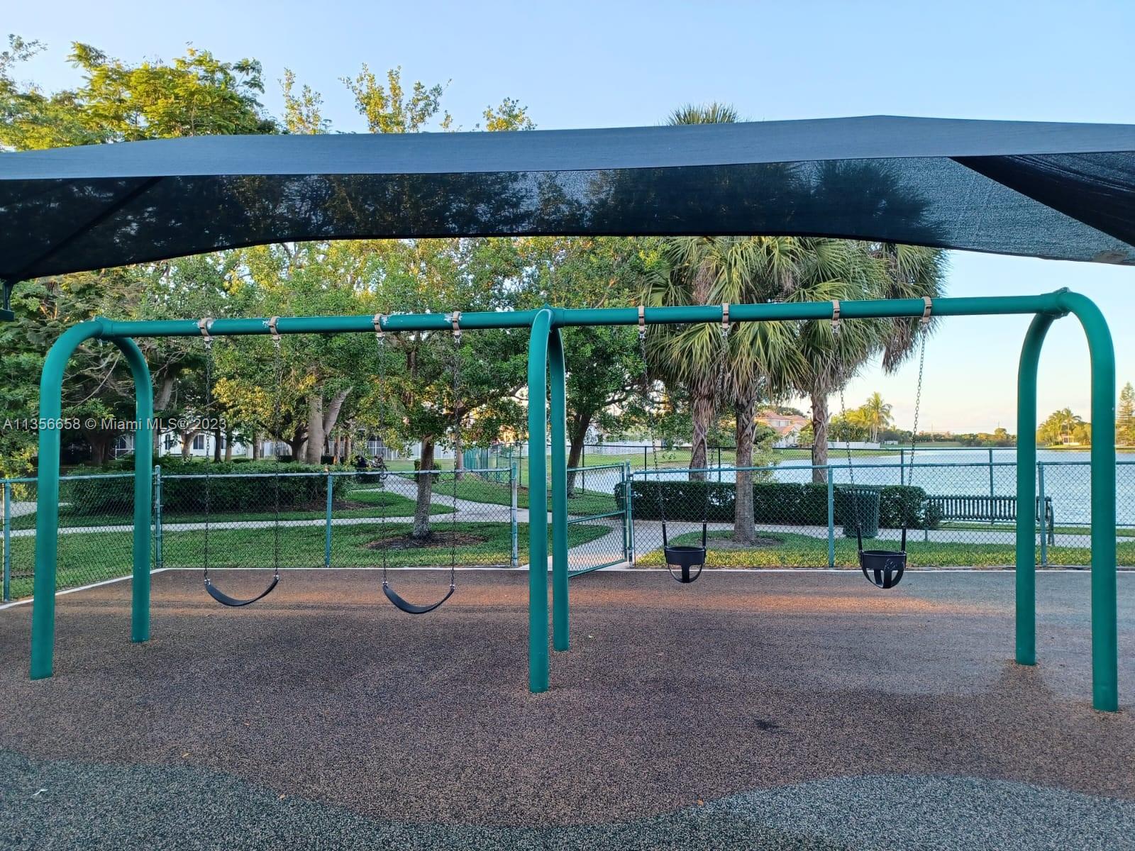 680 Falling Water Road Weston, FL 33326 - Photo 36 of 37 a view of outdoor space with trampoline