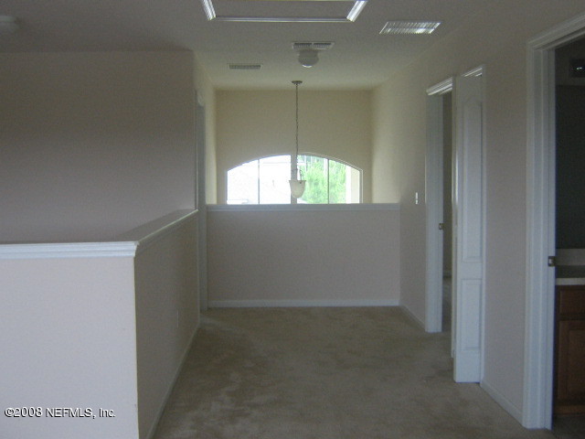 14423 Millhopper Road Jacksonville, FL 32258 - Photo 12 of 14 Hallway to two BR