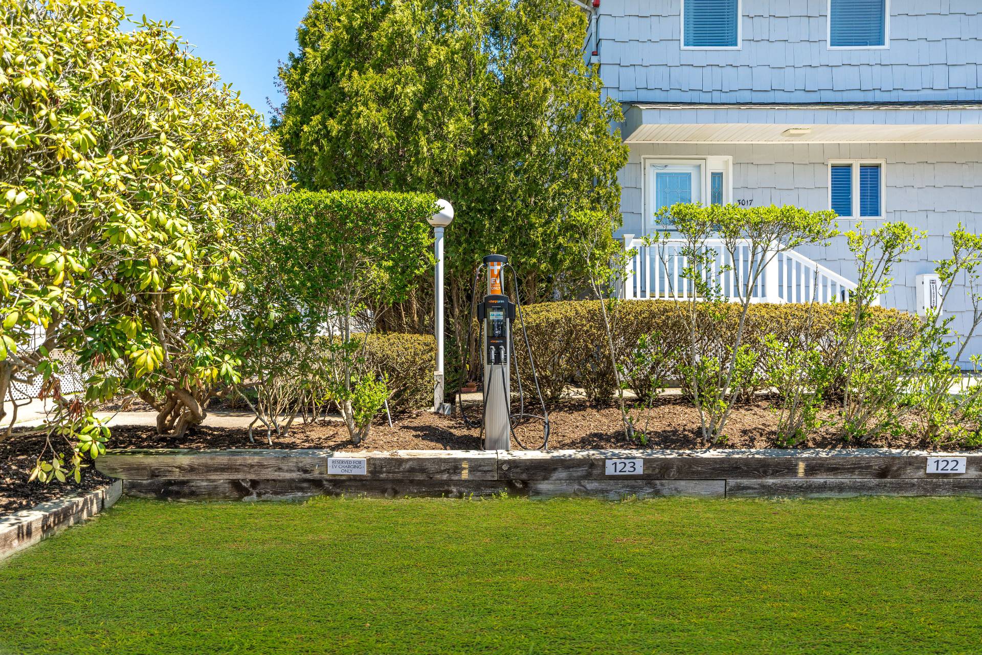 3012 Mitchell Road Westhampton Beach, NY 11978 - Photo 25 of 25 a view of swimming pool with outdoor seating and trees