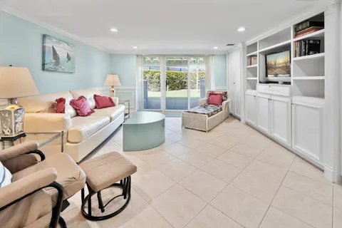 a living room with furniture and window