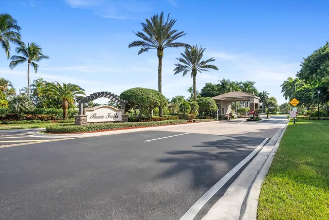 a view of a road with a big yard