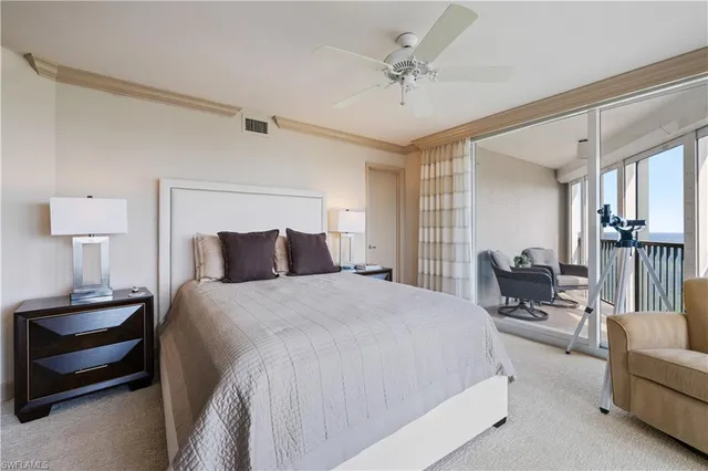 a bedroom with bed and window